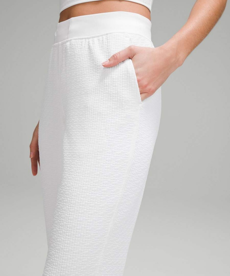Lululemon Textured High-Rise Flared Track 32