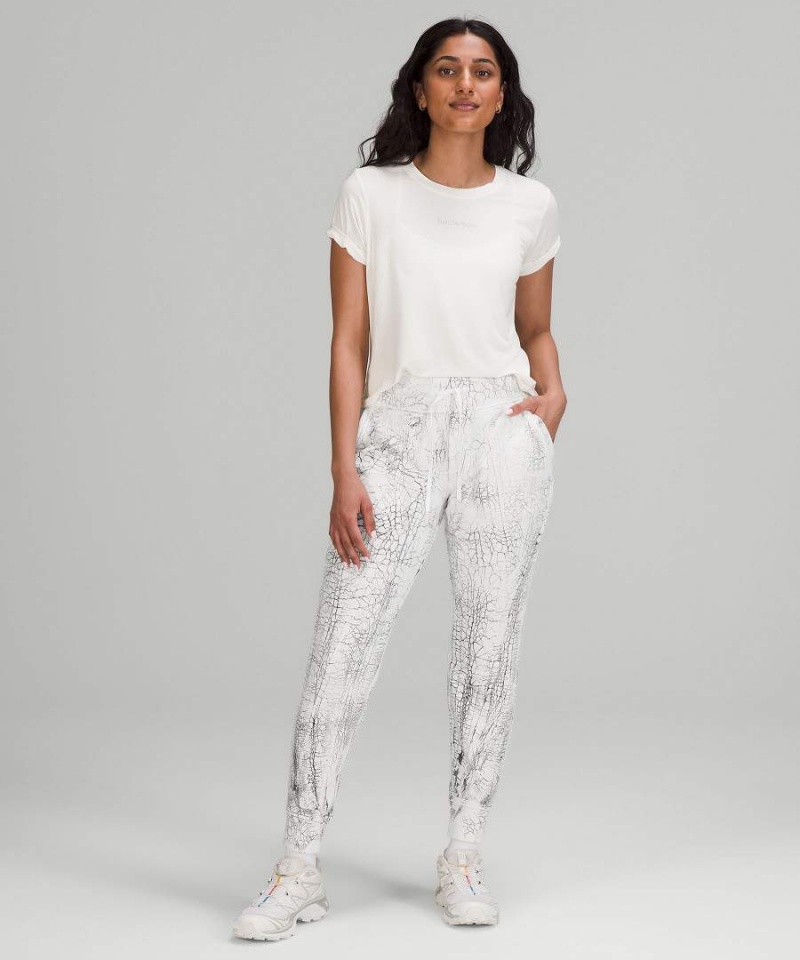 Lululemon Warm Down 7/8 Length Joggingbyxor Dam Vita Svarta Sverige | TBUYLX176