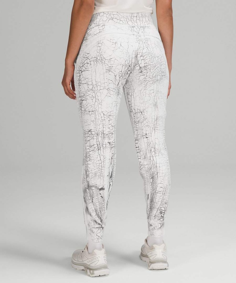 Lululemon Warm Down 7/8 Length Joggingbyxor Dam Vita Svarta Sverige | TBUYLX176